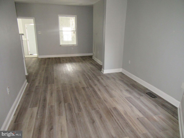 unfurnished room featuring light wood-type flooring