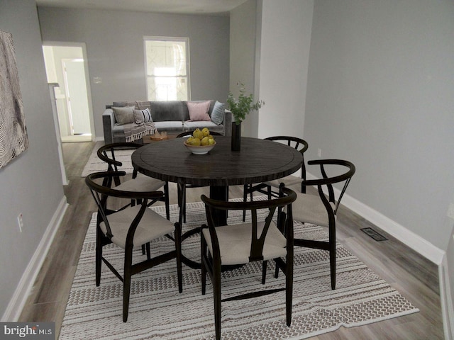 dining area featuring light hardwood / wood-style floors