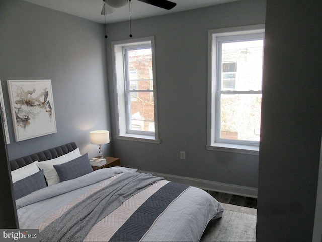 bedroom with hardwood / wood-style floors