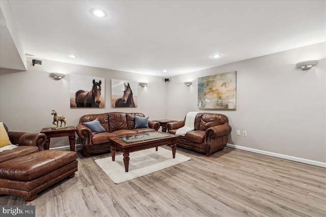 living room with light hardwood / wood-style floors