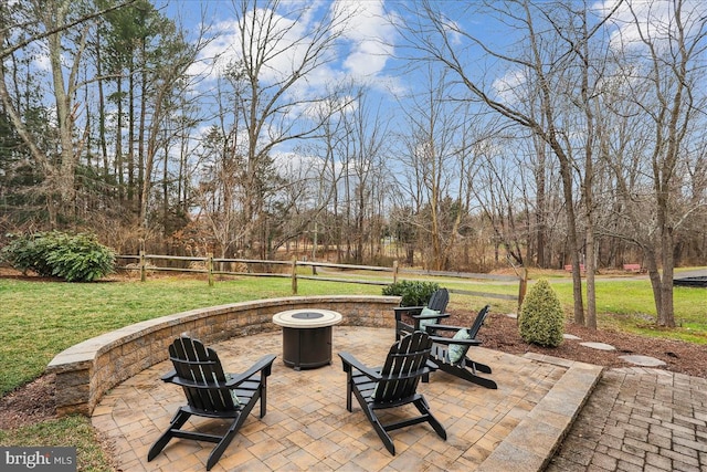 view of patio / terrace featuring a fire pit