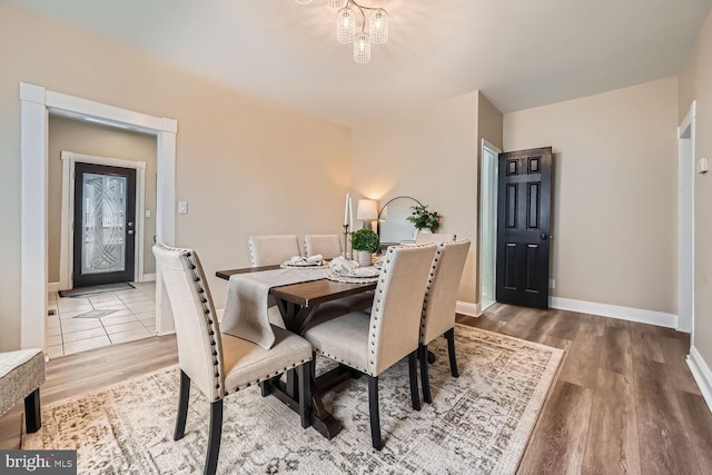 dining room with hardwood / wood-style floors