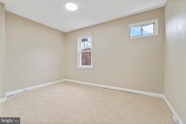 view of carpeted spare room