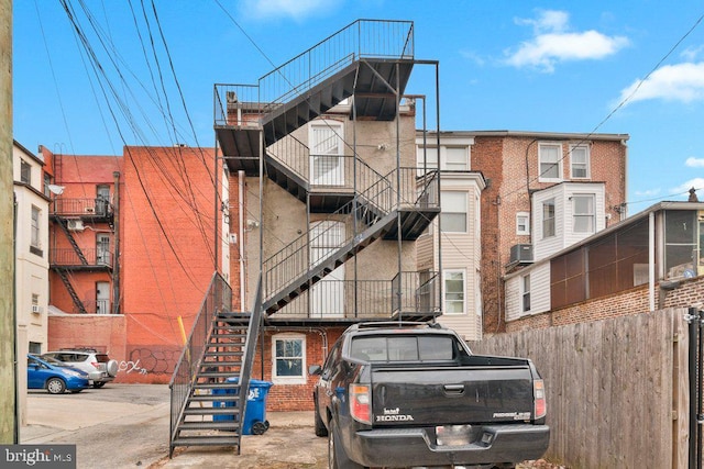 view of building exterior with central AC unit