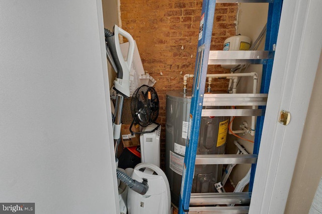 storage room featuring secured water heater