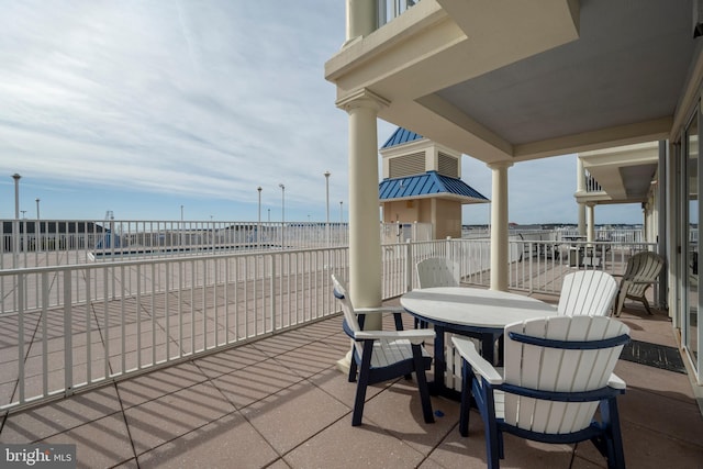 view of patio with a balcony