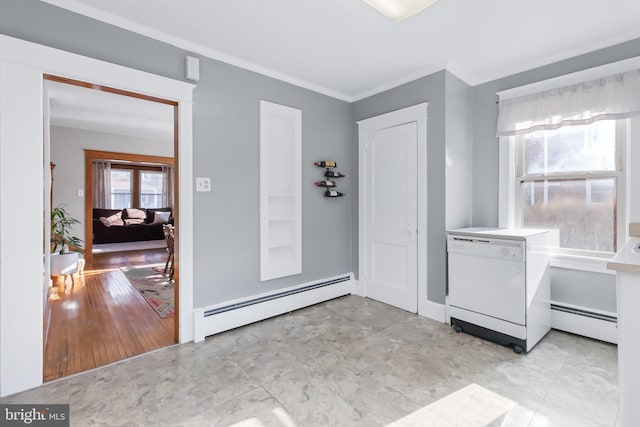 entrance foyer with a baseboard heating unit and crown molding