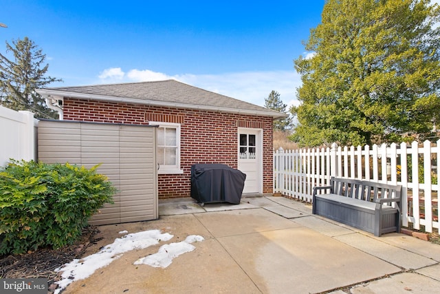 view of patio / terrace featuring a grill