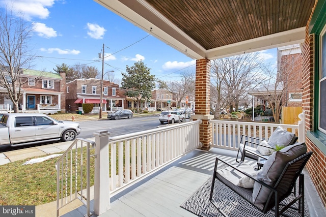 balcony featuring covered porch