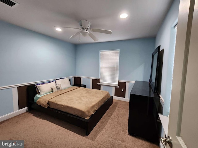 carpeted bedroom featuring ceiling fan