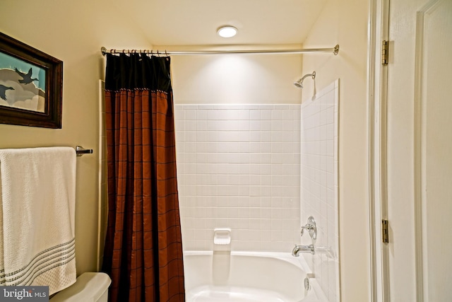 full bath featuring toilet and shower / tub combo