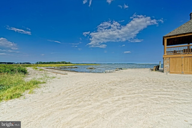 property view of water featuring a view of the beach