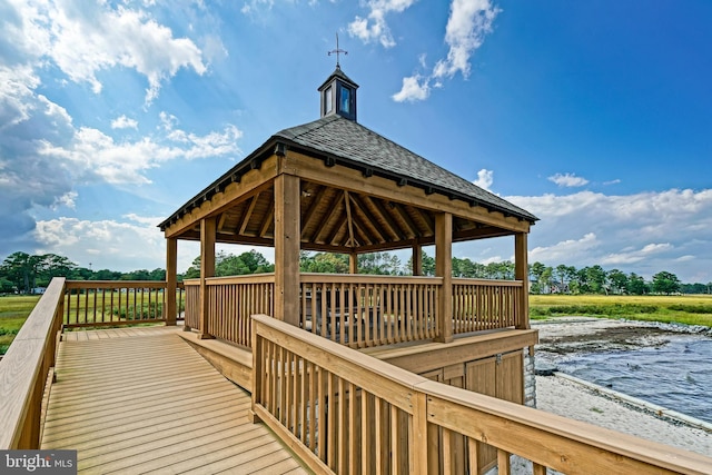 wooden deck with a gazebo