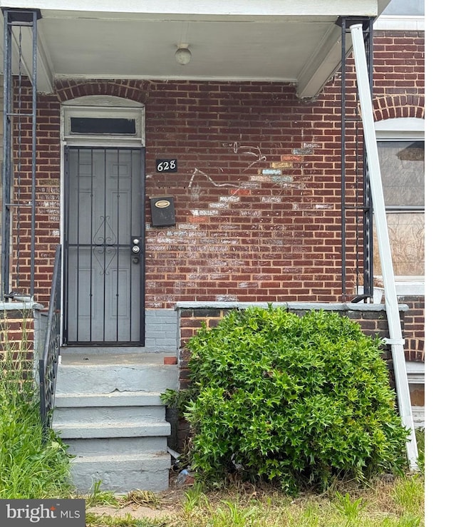 628 E Patapsco Ave, Baltimore, MD 21225 - view of exterior entry with brick siding
