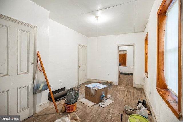 miscellaneous room with wood-type flooring