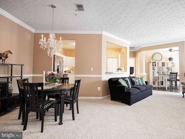 105 Sunshine Ct Unit F, Forest Hill, MD 21050 - dining space featuring visible vents, ornamental molding, a textured ceiling, ornate columns, and light carpet