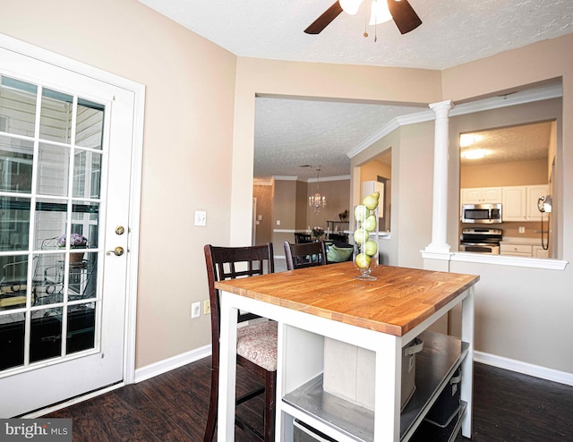 105 Sunshine Ct Unit F, Forest Hill, MD 21050 - dining space featuring a textured ceiling, decorative columns, and dark wood finished floors