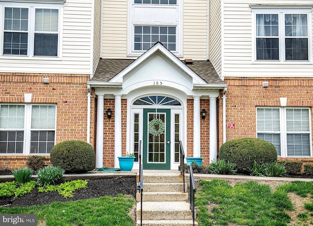 105 Sunshine Ct Unit F, Forest Hill, MD 21050 - doorway to property featuring a shingled roof and brick siding