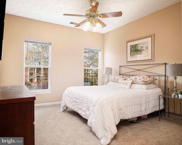 105 Sunshine Ct Unit F, Forest Hill, MD 21050 - bedroom featuring visible vents, multiple windows, carpet flooring, and a textured ceiling
