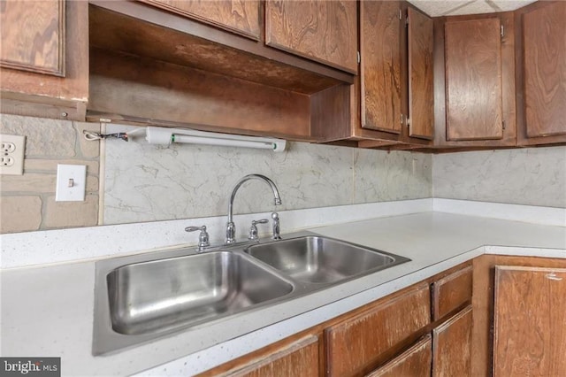 kitchen with sink and backsplash