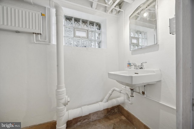 bathroom with tile patterned flooring