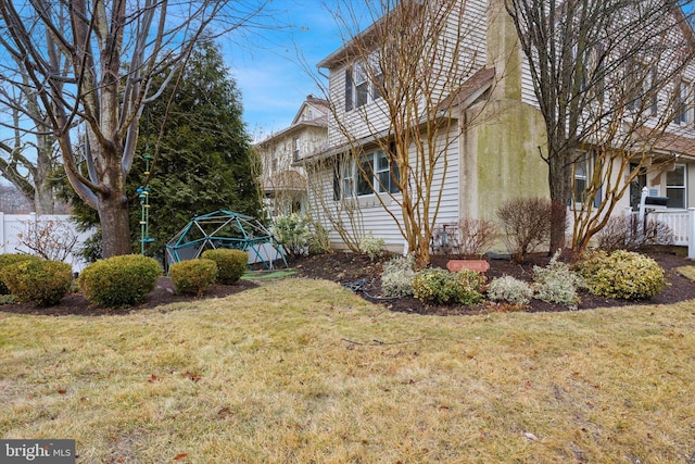 view of home's exterior featuring a lawn