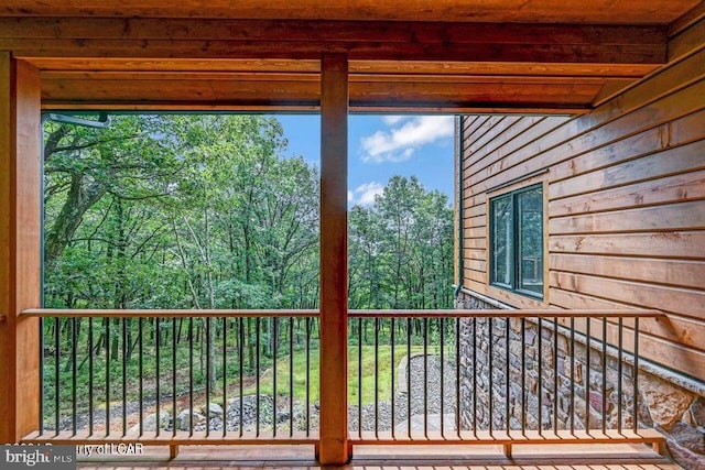 entryway with beam ceiling