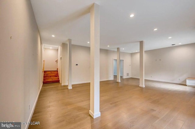 basement featuring light wood-type flooring