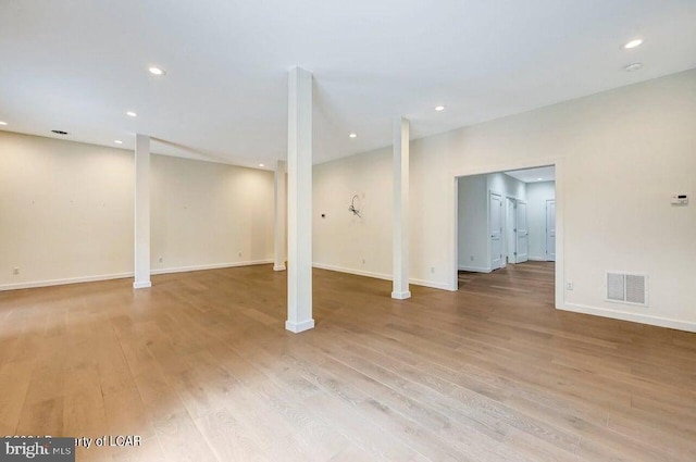 basement featuring light hardwood / wood-style flooring