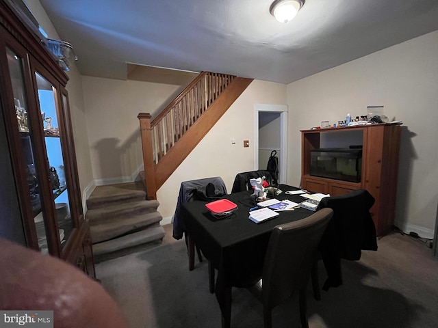 view of carpeted dining space