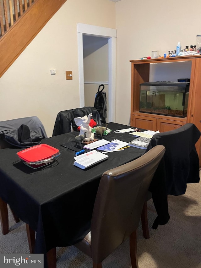 view of carpeted dining room