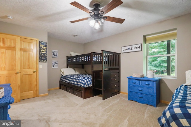 carpeted bedroom with a textured ceiling