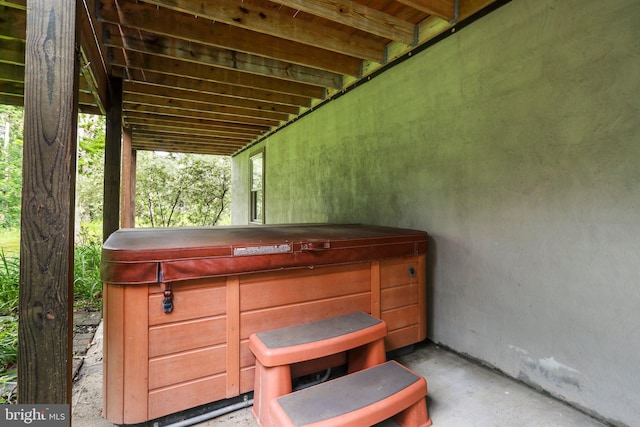 view of patio / terrace with a hot tub