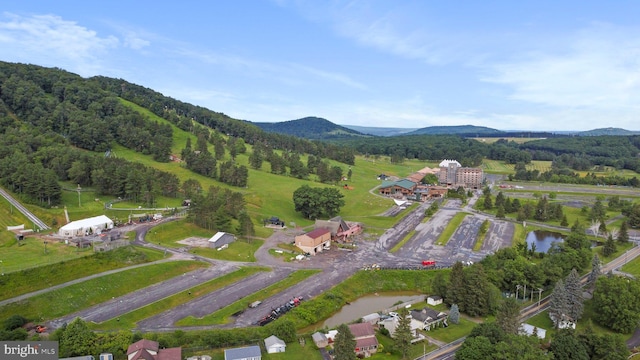 bird's eye view with a water and mountain view