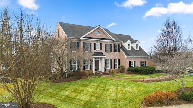 view of front of home featuring a front yard