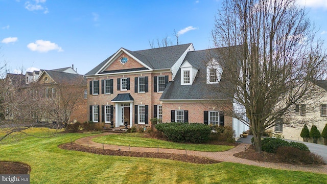 view of front of house with a front lawn