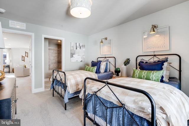 bedroom featuring carpet, visible vents, and baseboards