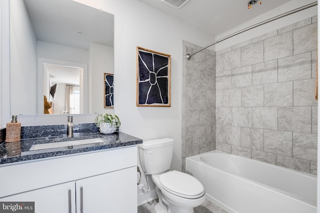 full bath featuring toilet, vanity, visible vents, and bathing tub / shower combination