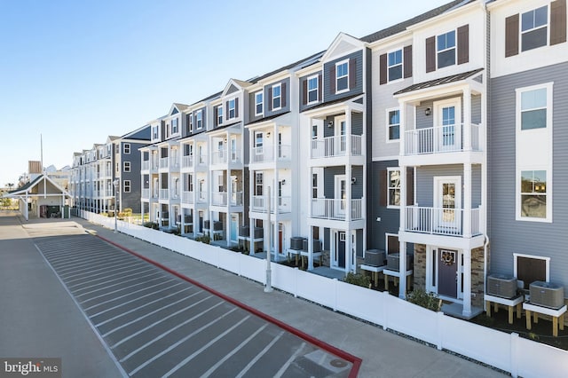 view of property with central AC unit