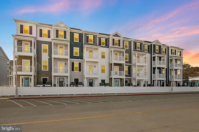 view of property at dusk