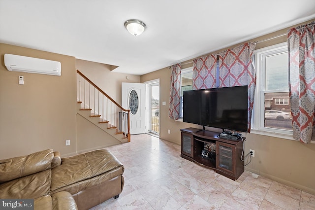 living room featuring an AC wall unit