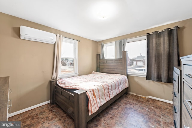 bedroom with a wall unit AC