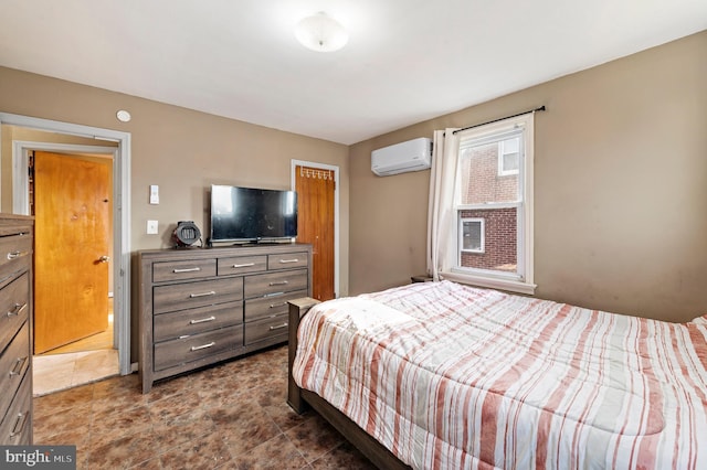 bedroom with a wall mounted air conditioner