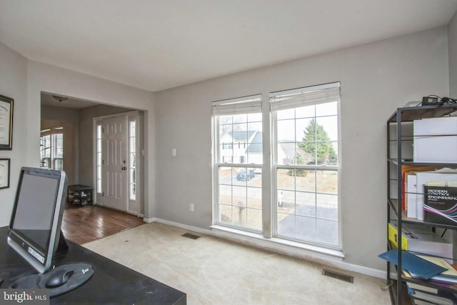 workout room featuring carpet flooring