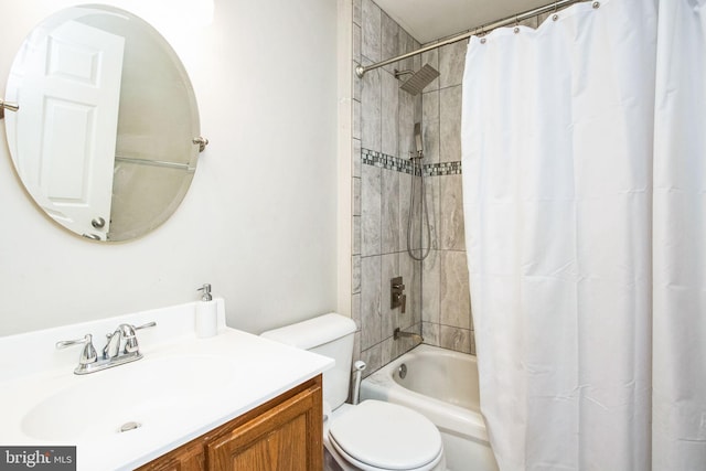 full bathroom featuring vanity, shower / bathtub combination with curtain, and toilet