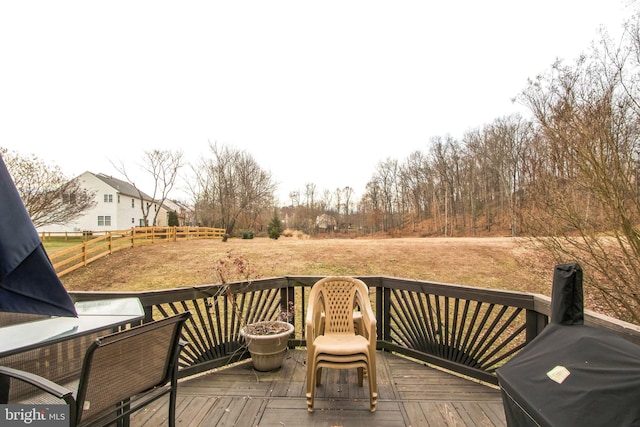 wooden deck featuring grilling area