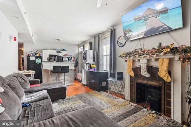 living room with parquet flooring and ceiling fan