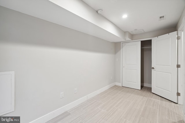 unfurnished bedroom featuring a closet