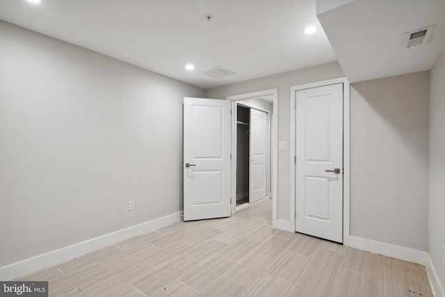 unfurnished bedroom featuring light hardwood / wood-style floors