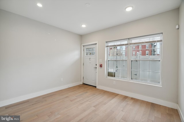 empty room with light wood-type flooring